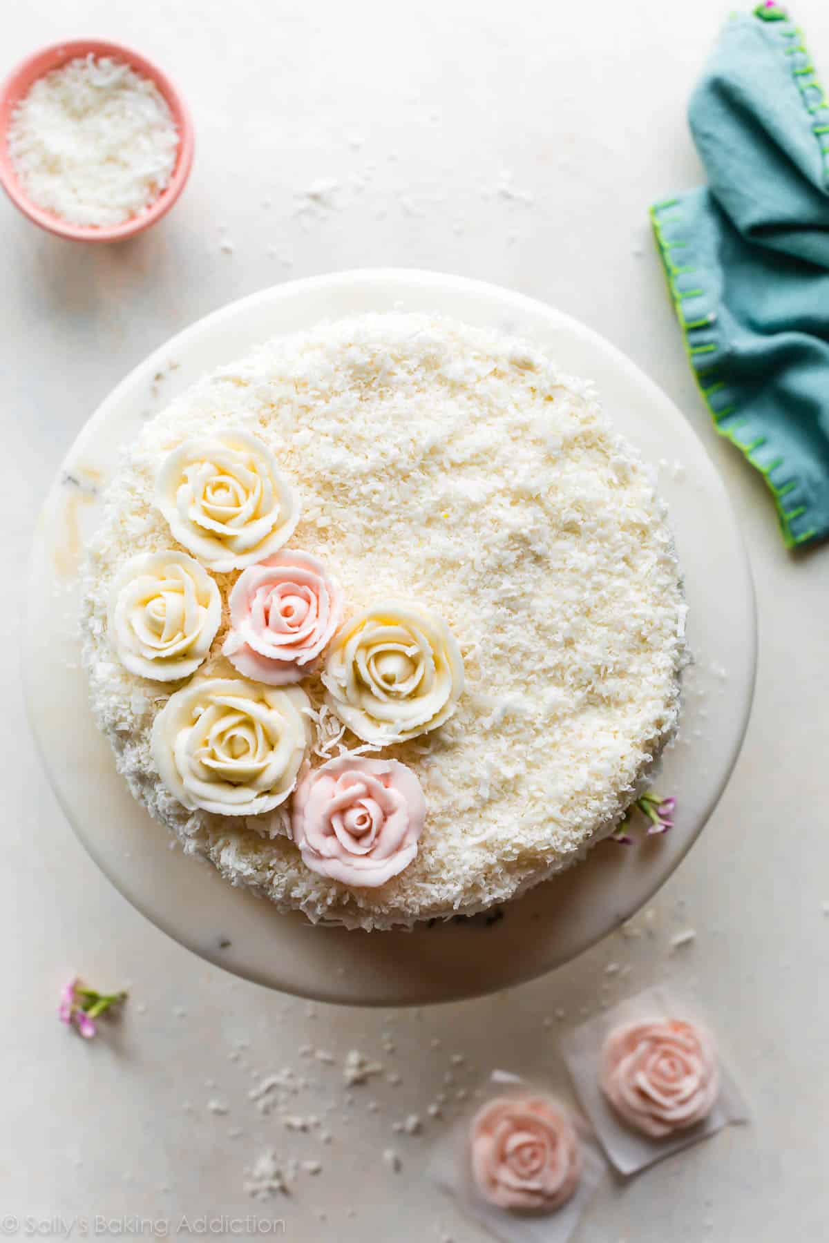 Overhead shot of coconut cake with buttercream roses