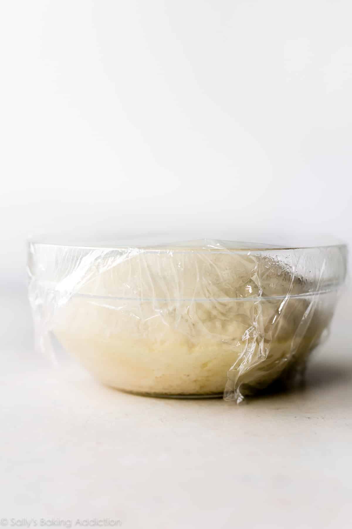 Dough doubled in size in glass bowl