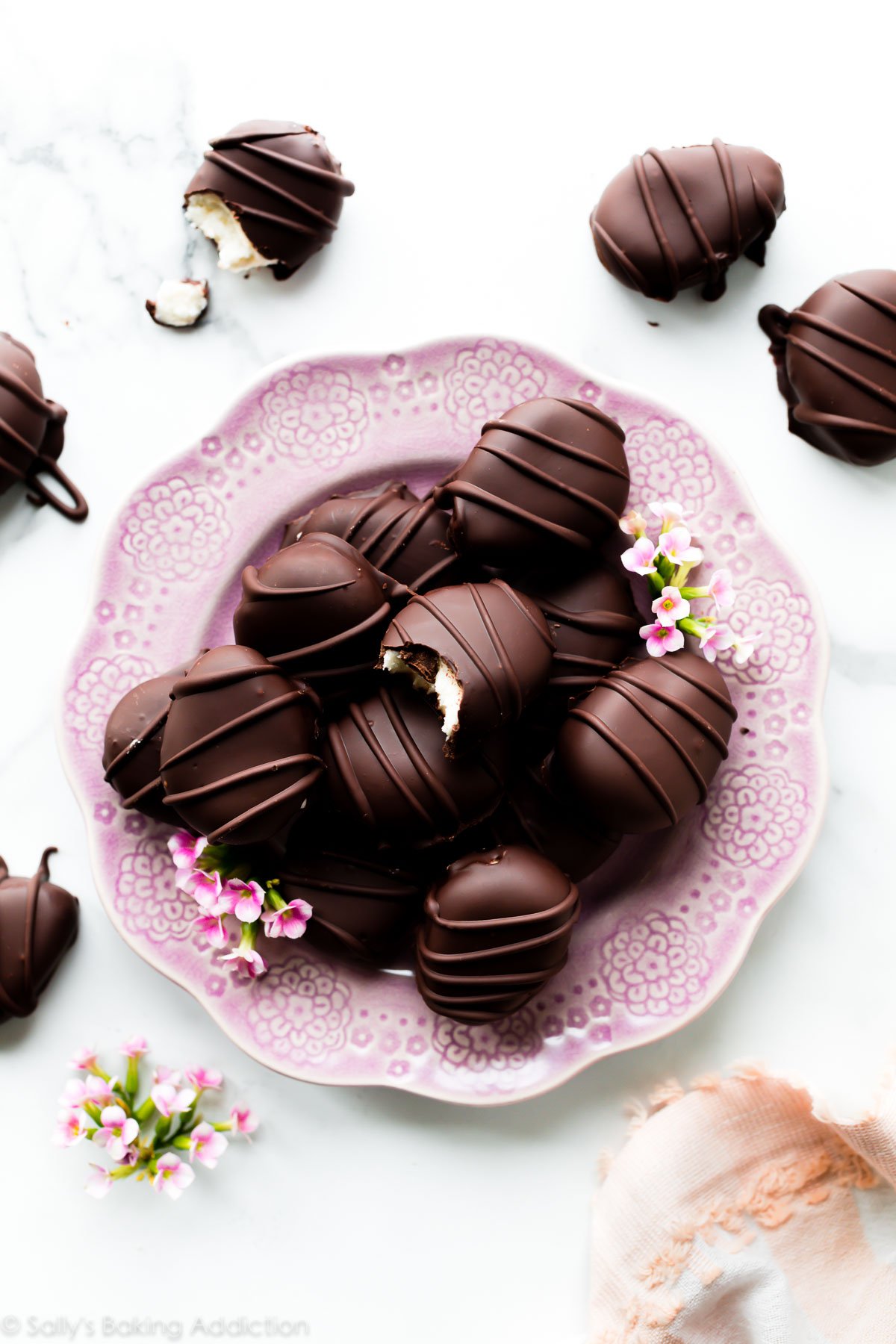 Chocolate covered buttercream Easter eggs on pink plate