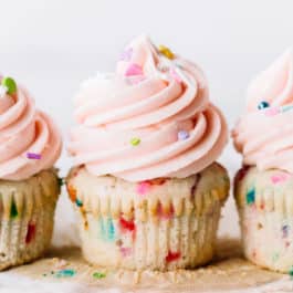 Sprinkle cupcakes with pink vanilla buttercream