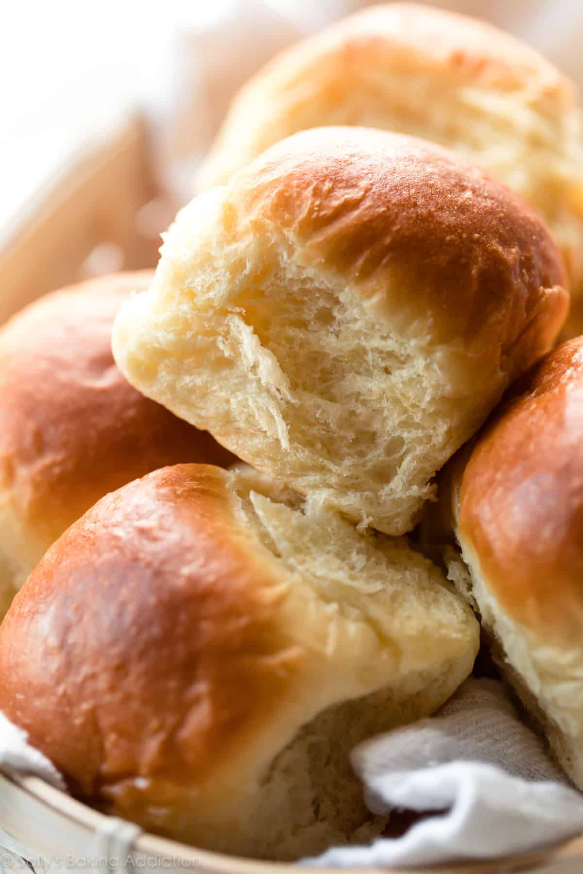 close up of dinner rolls in a basket