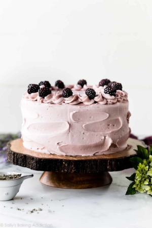 Lavender cake on wooden cake stand