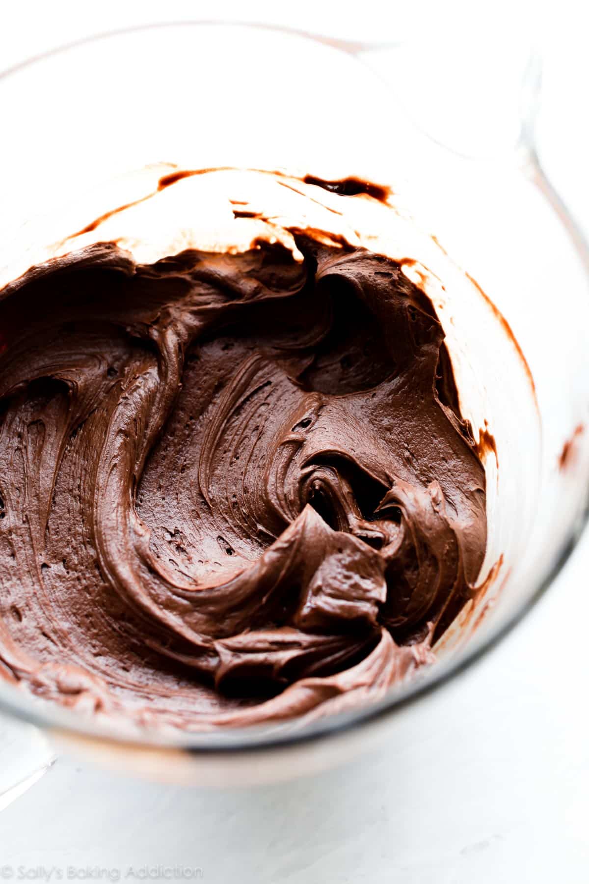 chocolate frosting in glass bowl.