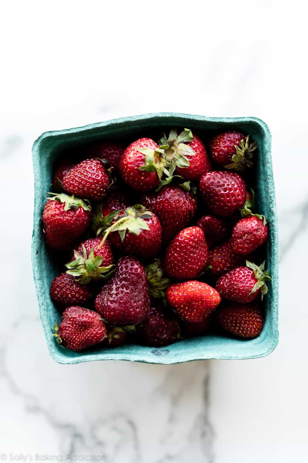 Organic strawberries in a carton