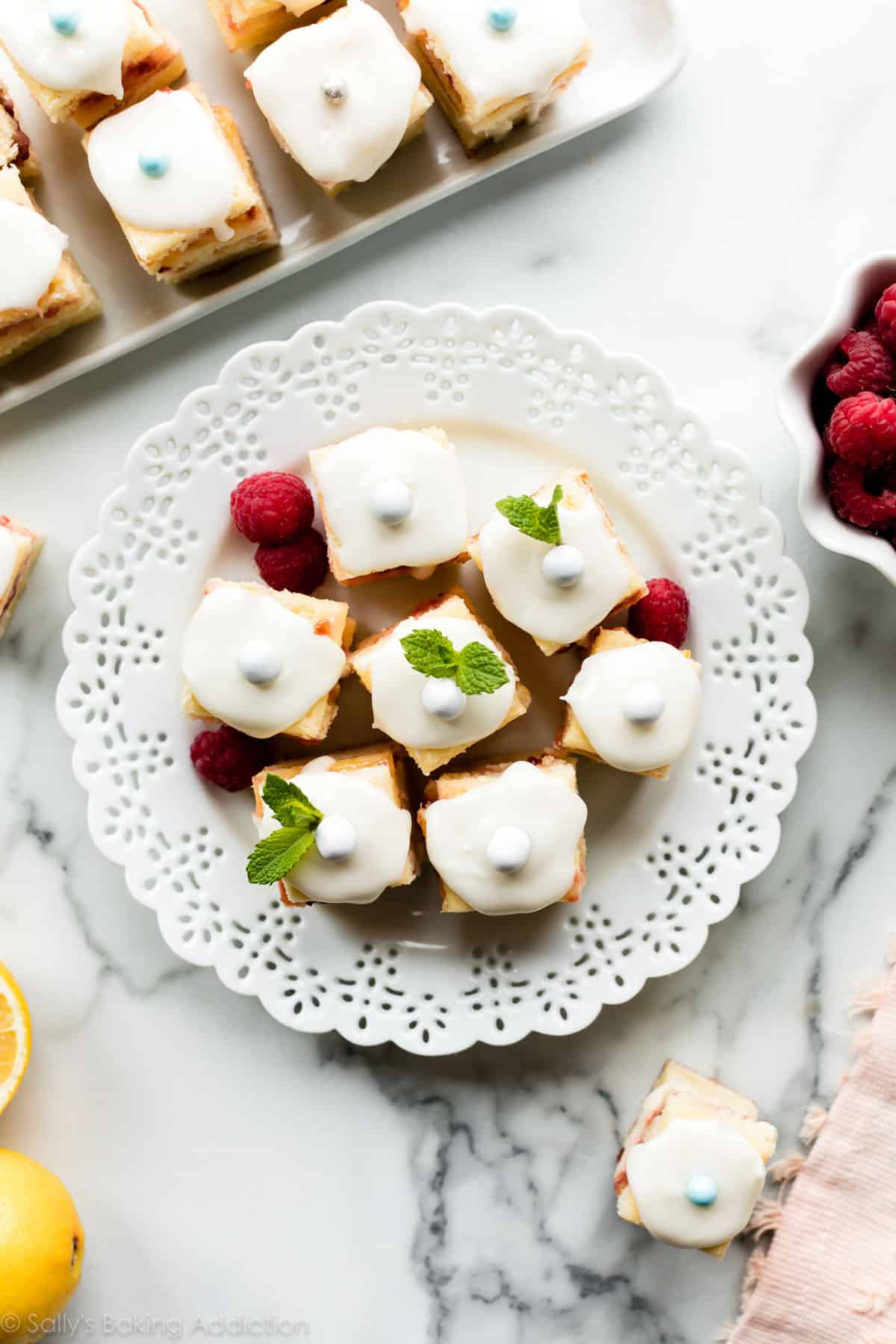 Lemon berry petit fours on white plate