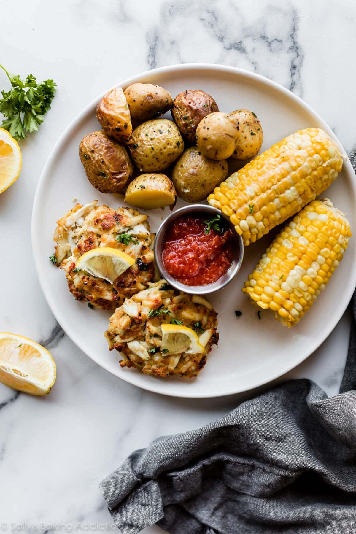 Crab cake meal with corn and potatoes