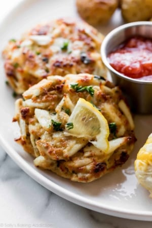 Maryland crab cakes with cocktail sauce and lemon