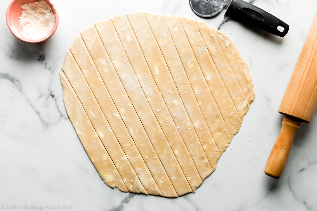 rolled out pie dough cut into 1 inch strips