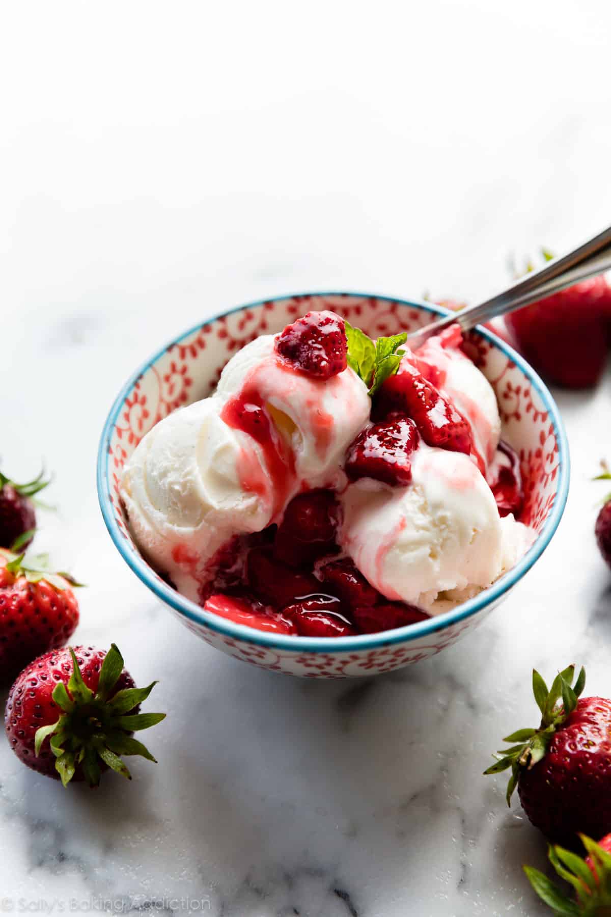 strawberry dessert topping on ice cream