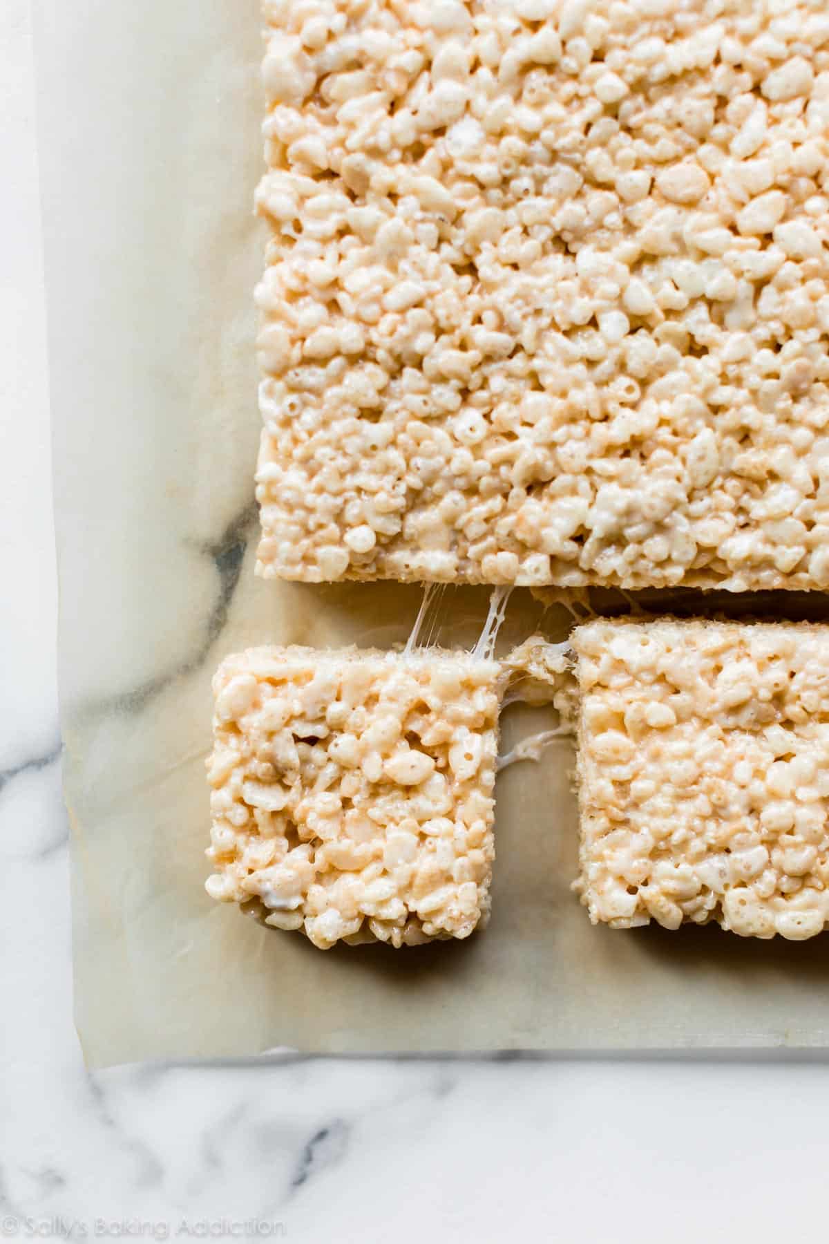crispy rice squares treats with 1 corner slice cut out.