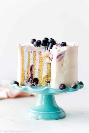 vertical cake on a teal cake stand
