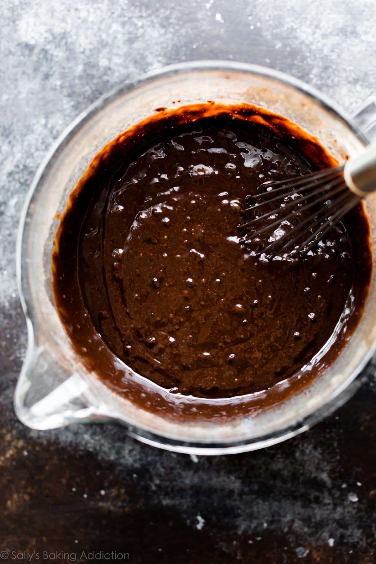 chocolate cake batter in glass bowl