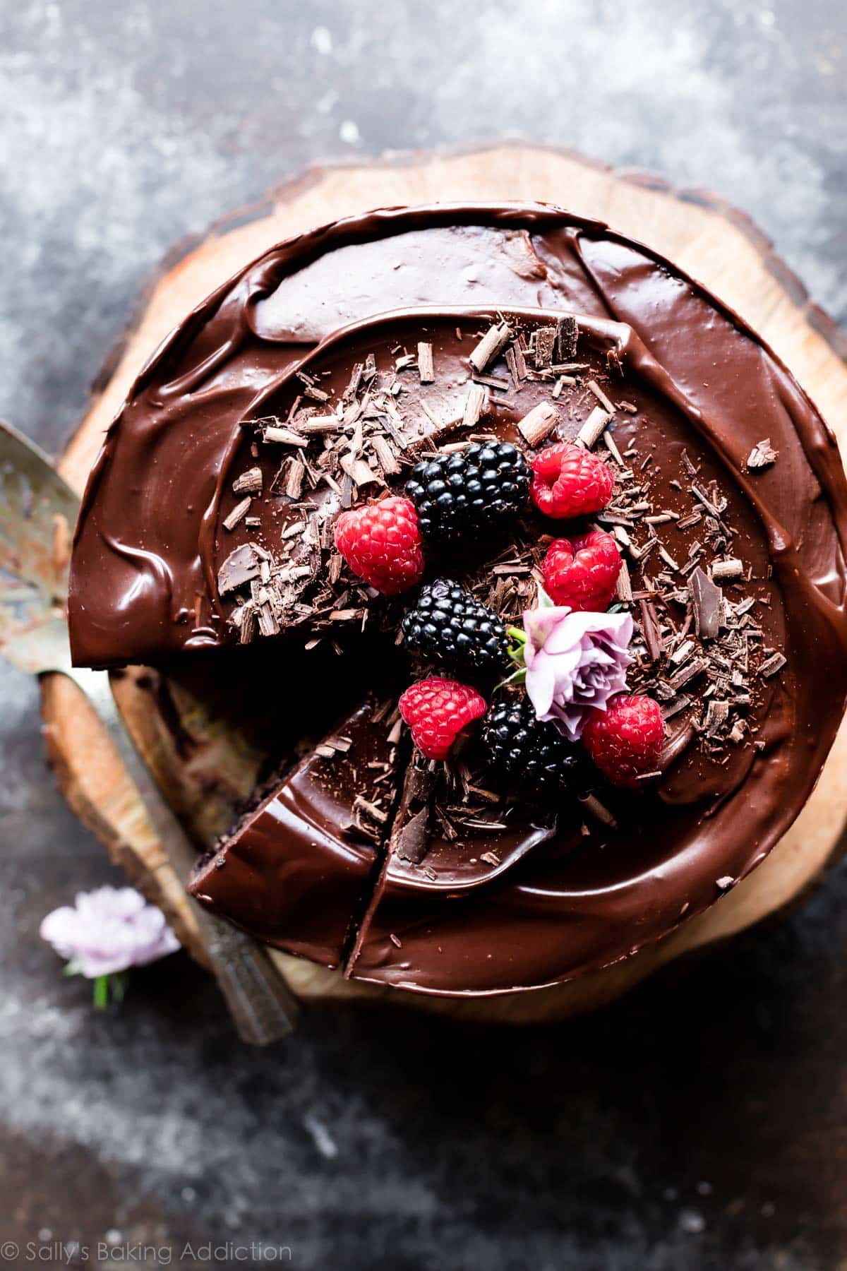 top of chocolate mousse cake with berries and chocolate shavings