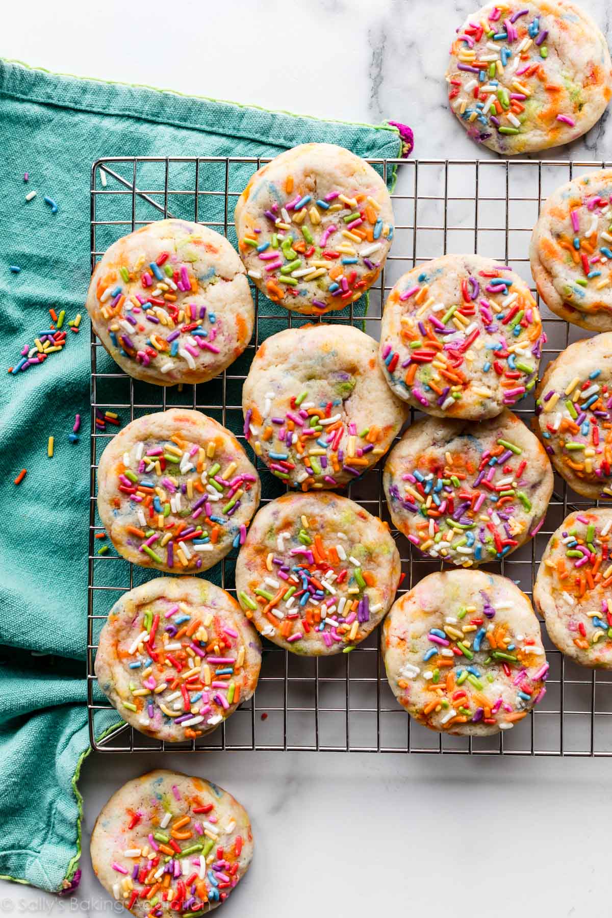 drop sugar cookies with sprinkles on a cooling rack