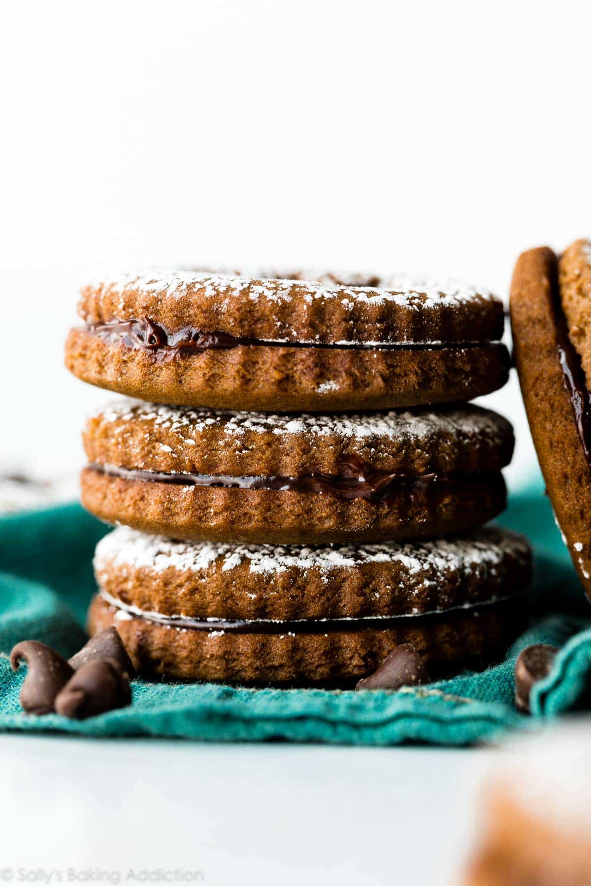 stack of chocolate gingerbread cookie sandwiches