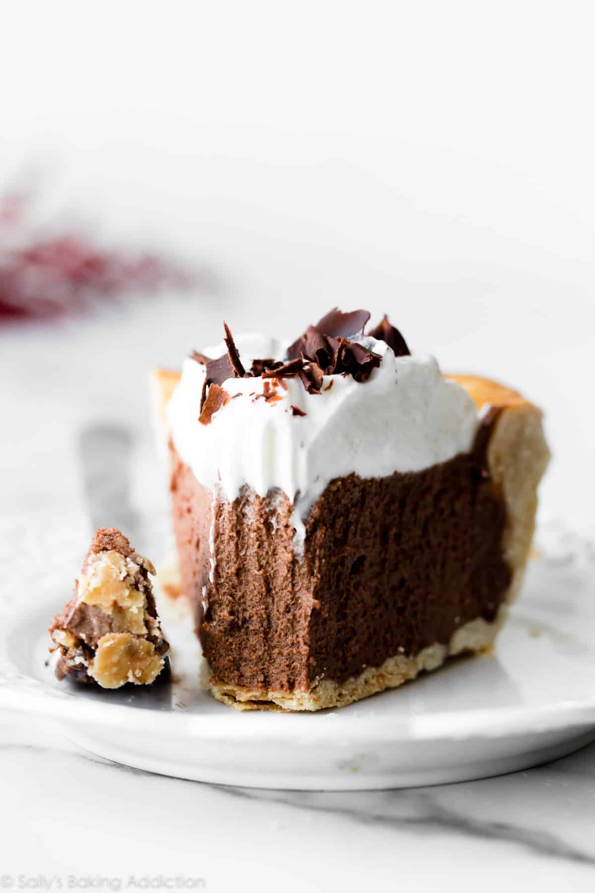 slice of French silk pie on a white plate