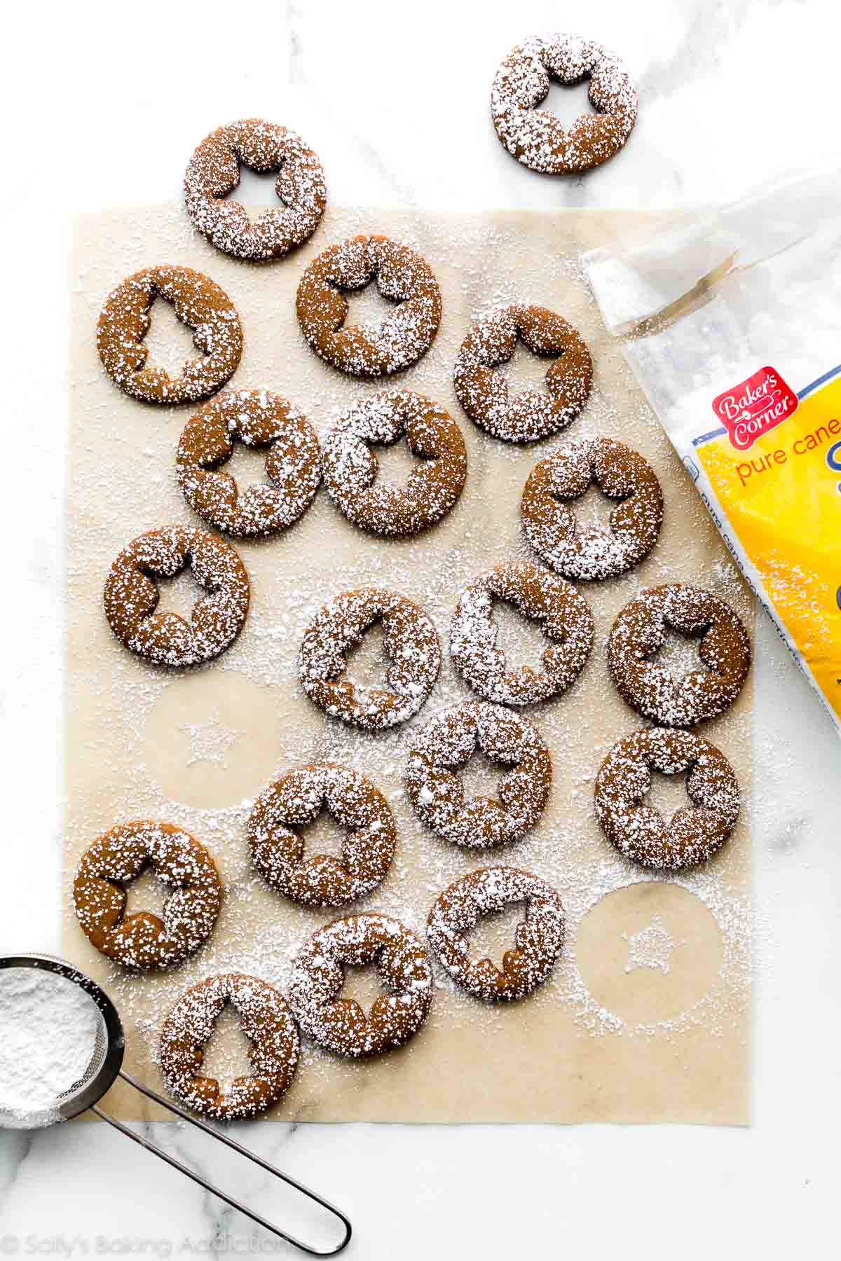 gingerbread cookies with powdered sugar on top