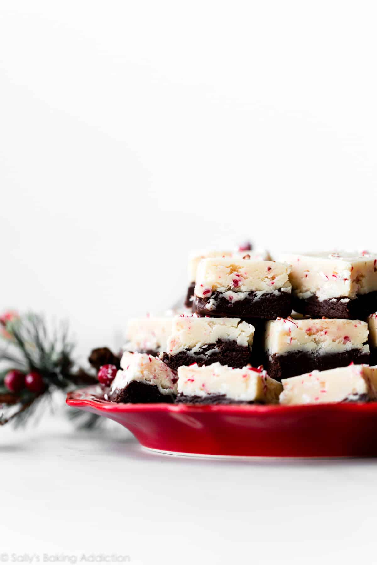 peppermint bark fudge on a red plate