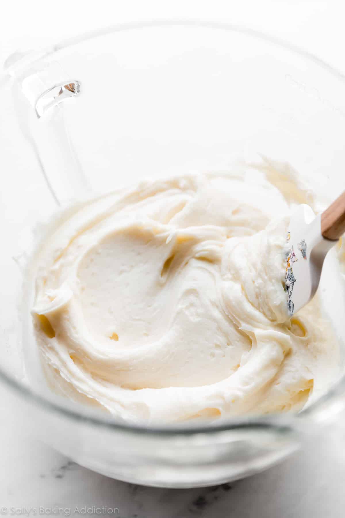smooth vanilla frosting in mixing bowl