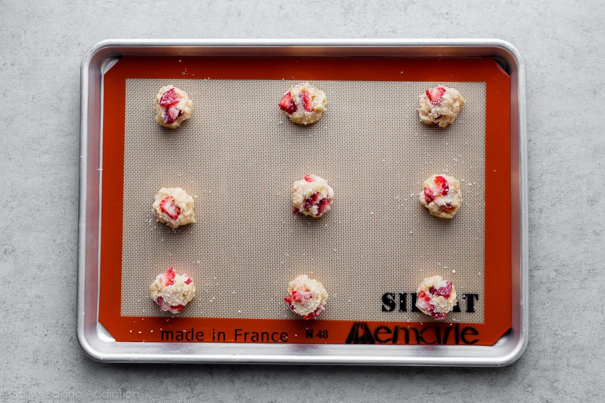 strawberry biscuit cookie dough on baking sheet