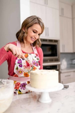 sally frosting a cake