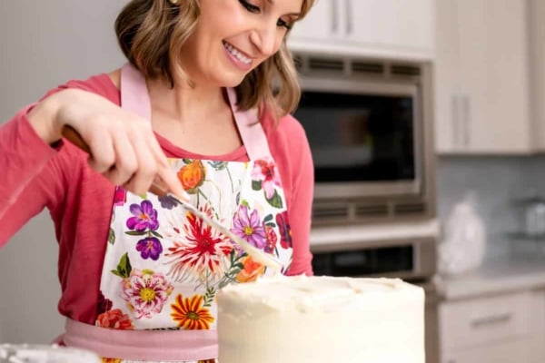 sally frosting a cake