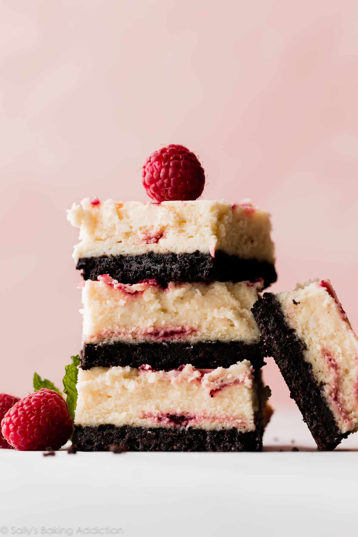 stack of white chocolate raspberry cheesecake bars