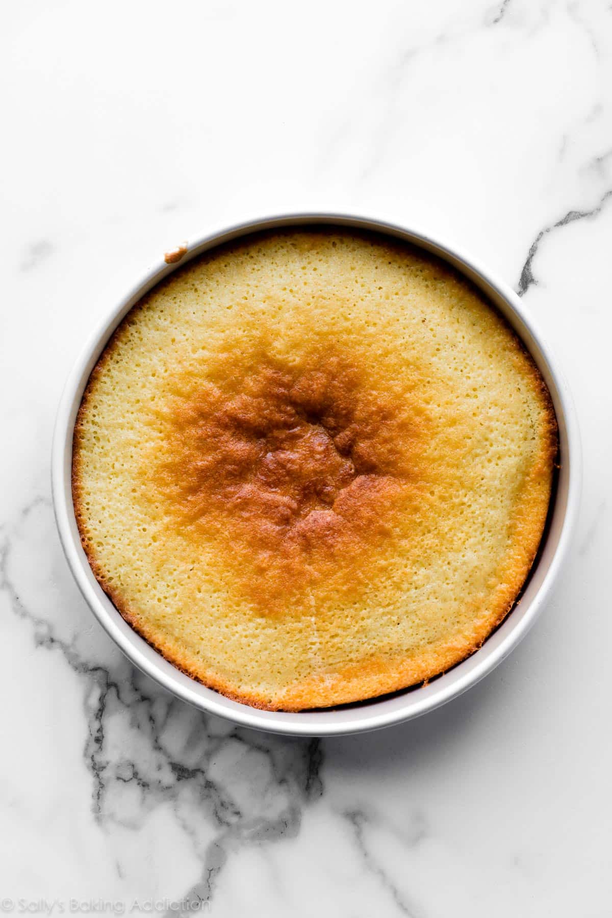 overcooked yellow cake in a 9 inch cake pan