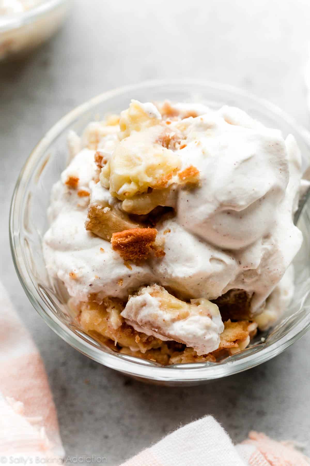 bowl of banana pudding with whipped cream