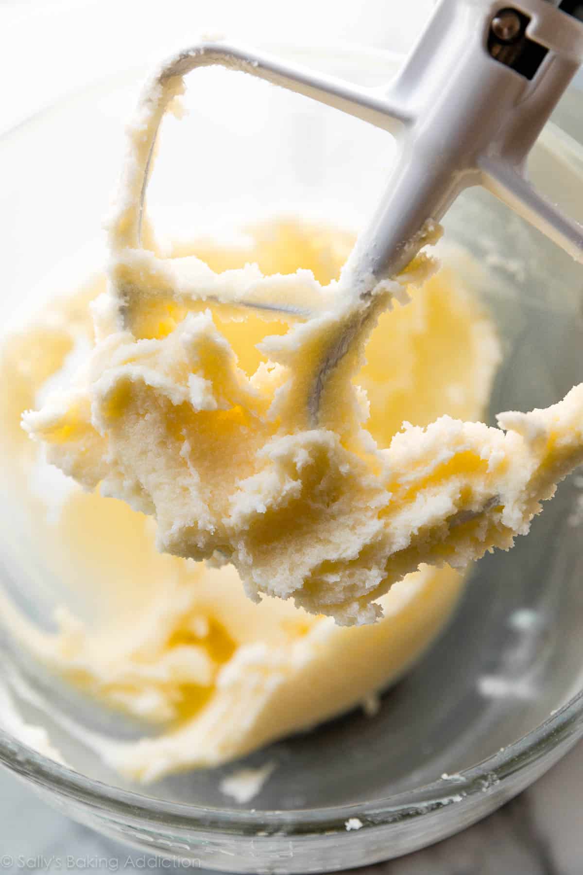 creamed butter and sugar on a mixer flat beater attachment