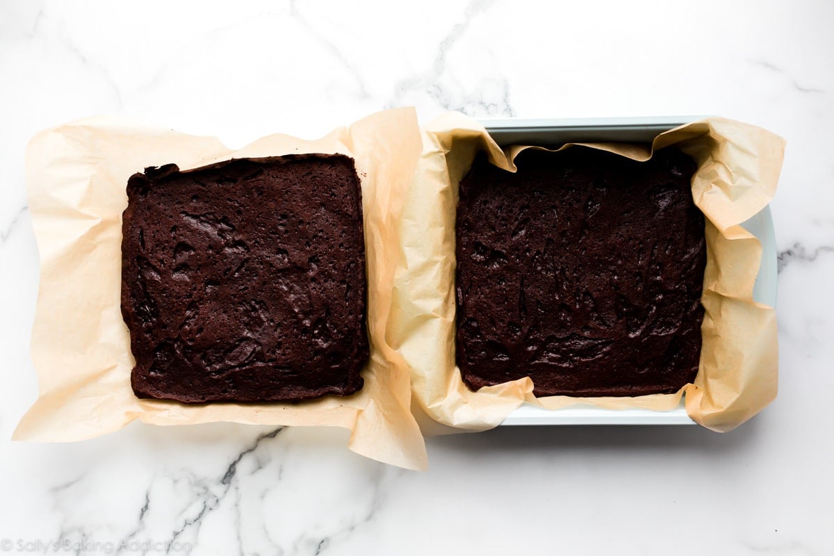 large brownie squares on parchment paper