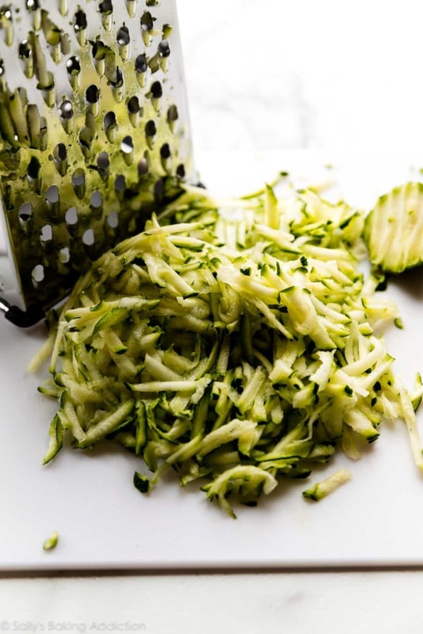 shredded zucchini with box grater.