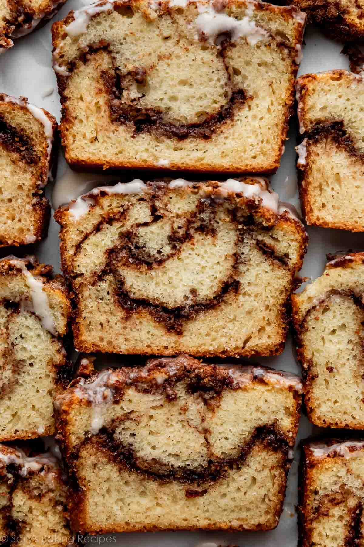 slices of cinnamon swirl bread with icing on top.