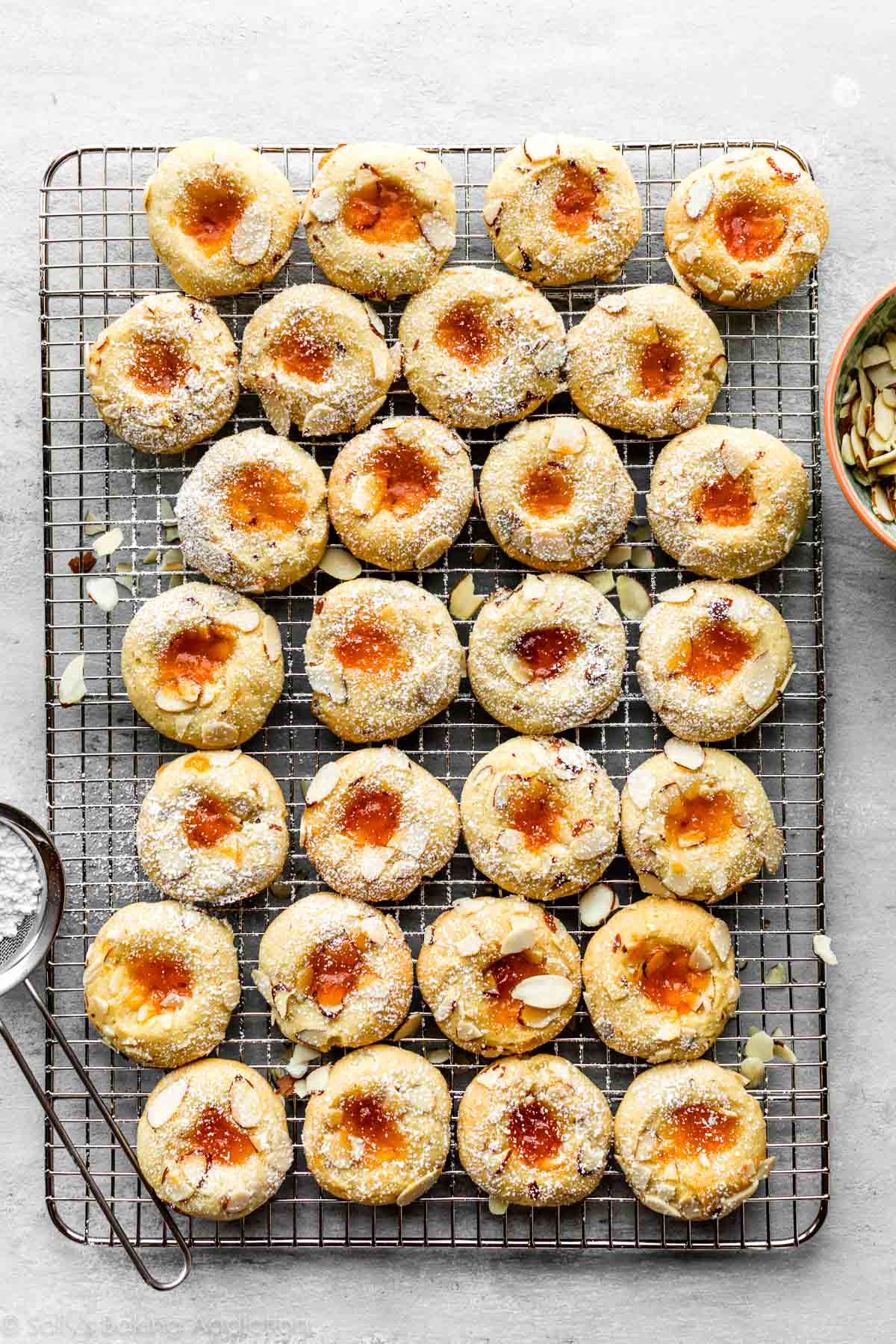 cream cheese apricot thumbprint cookies on cooling rack
