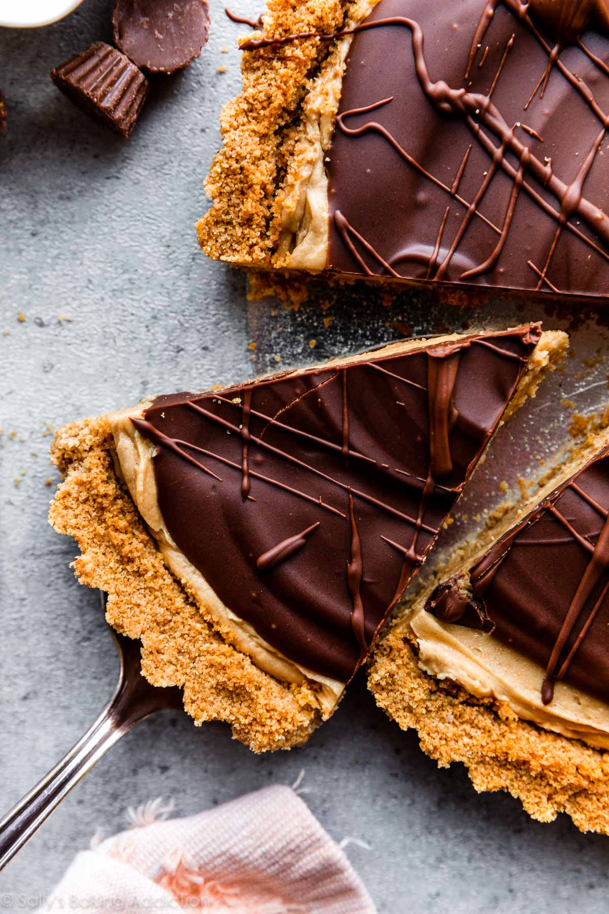 removing a slice of peanut butter cup tart