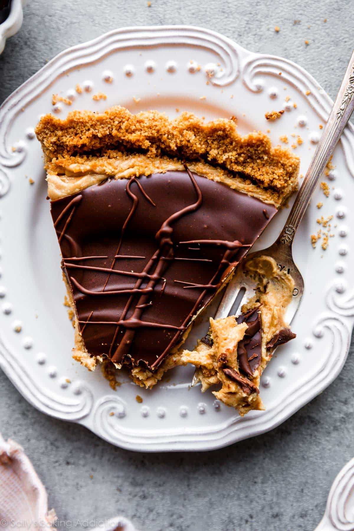 slice of peanut butter cup tart on a white plate