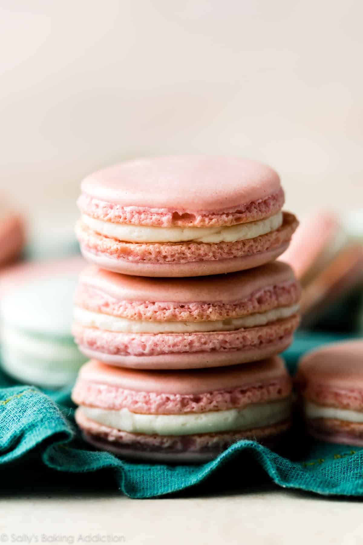 stack of 3 pink macarons