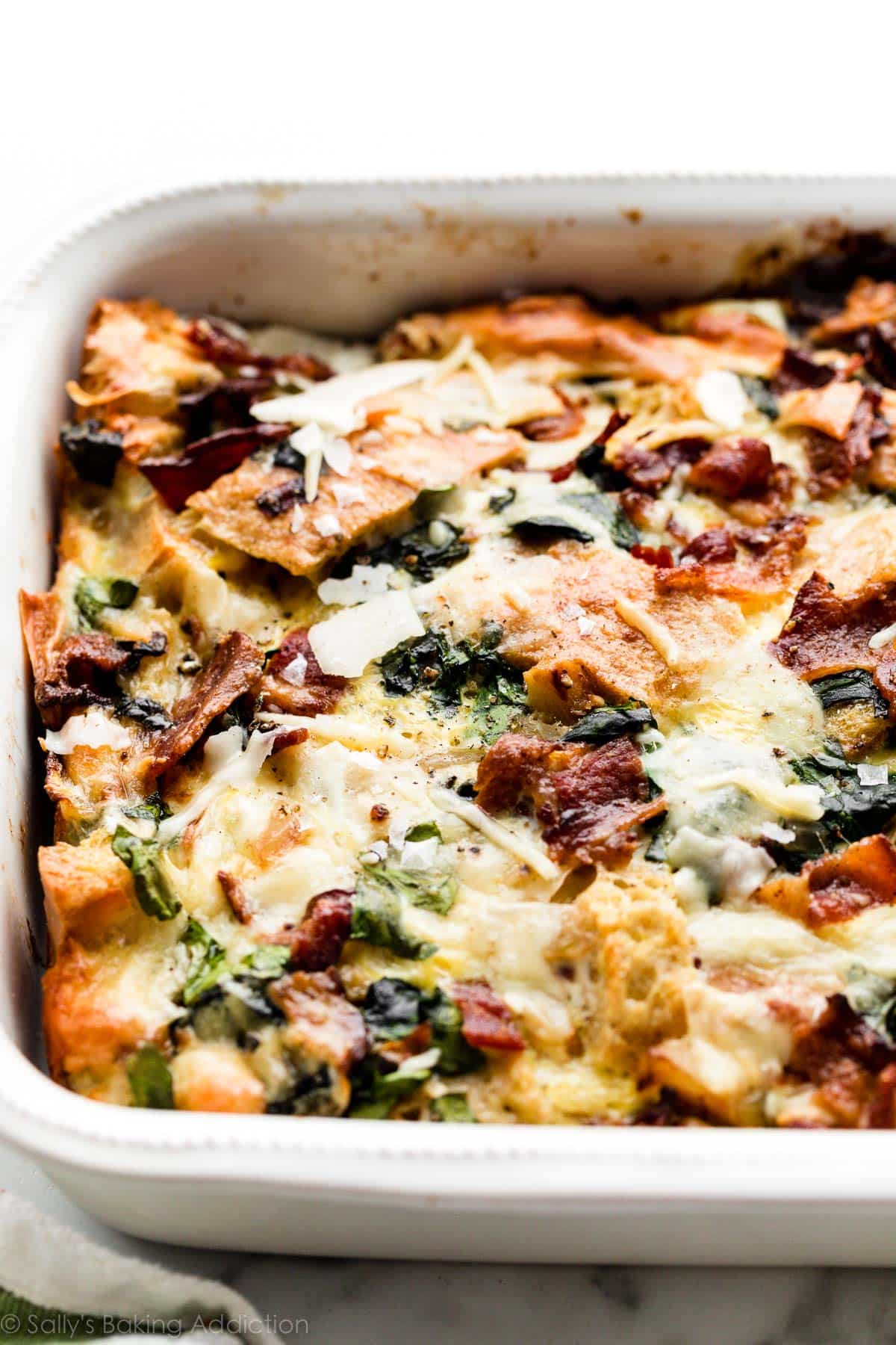 breakfast strata with eggs, spinach, and bacon