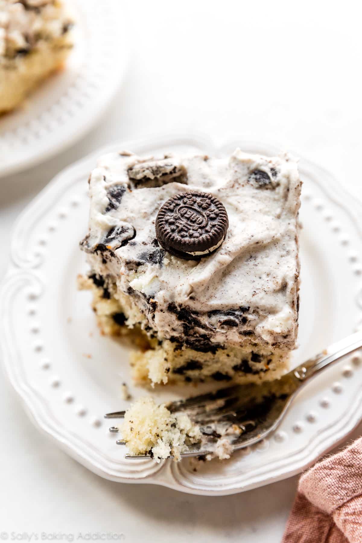 cookies and cream sheet cake slice on white plate