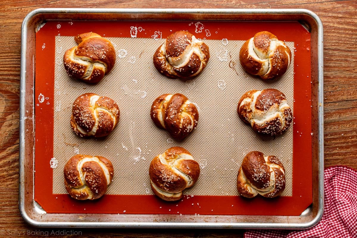 soft pretzel knots on baking sheet after baking