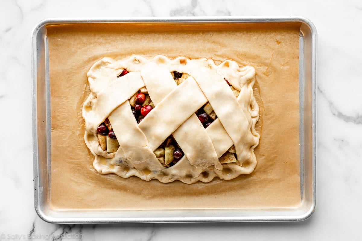 cranberry apple slab pie with lattice crust before baking