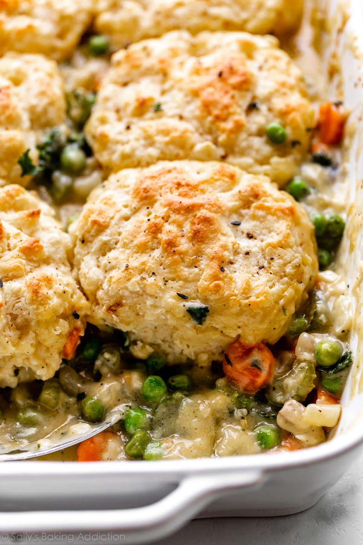 close up photo of biscuit topped vegetable pot pie