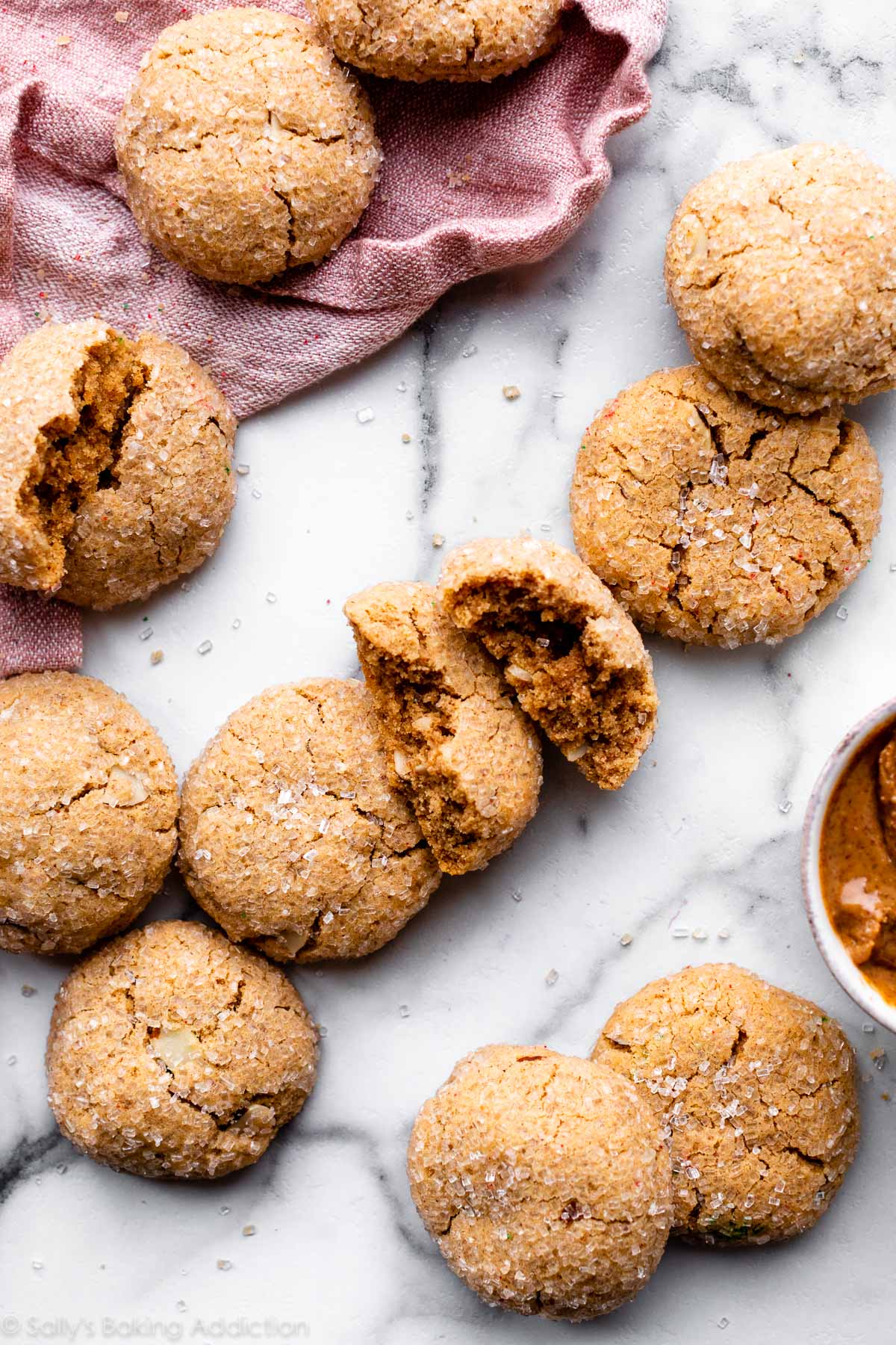 thick almond butter cookies rolled in coarse sugar sprinkles