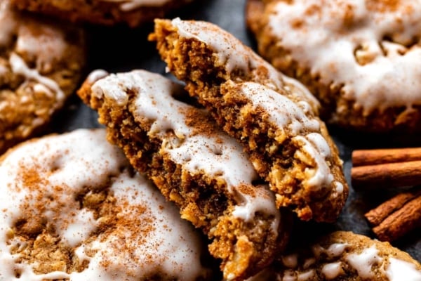 gingerbread oatmeal cookies with icing and cinnamon on top