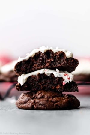 thick peppermint chocolate cookies broken in half and stacked