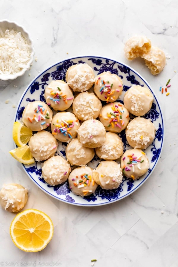 lemon coconut shortbread drop cookies with glaze and sprinkles on top