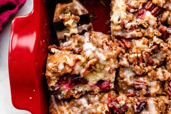 cranberry pecan crumb cake in red baking dish