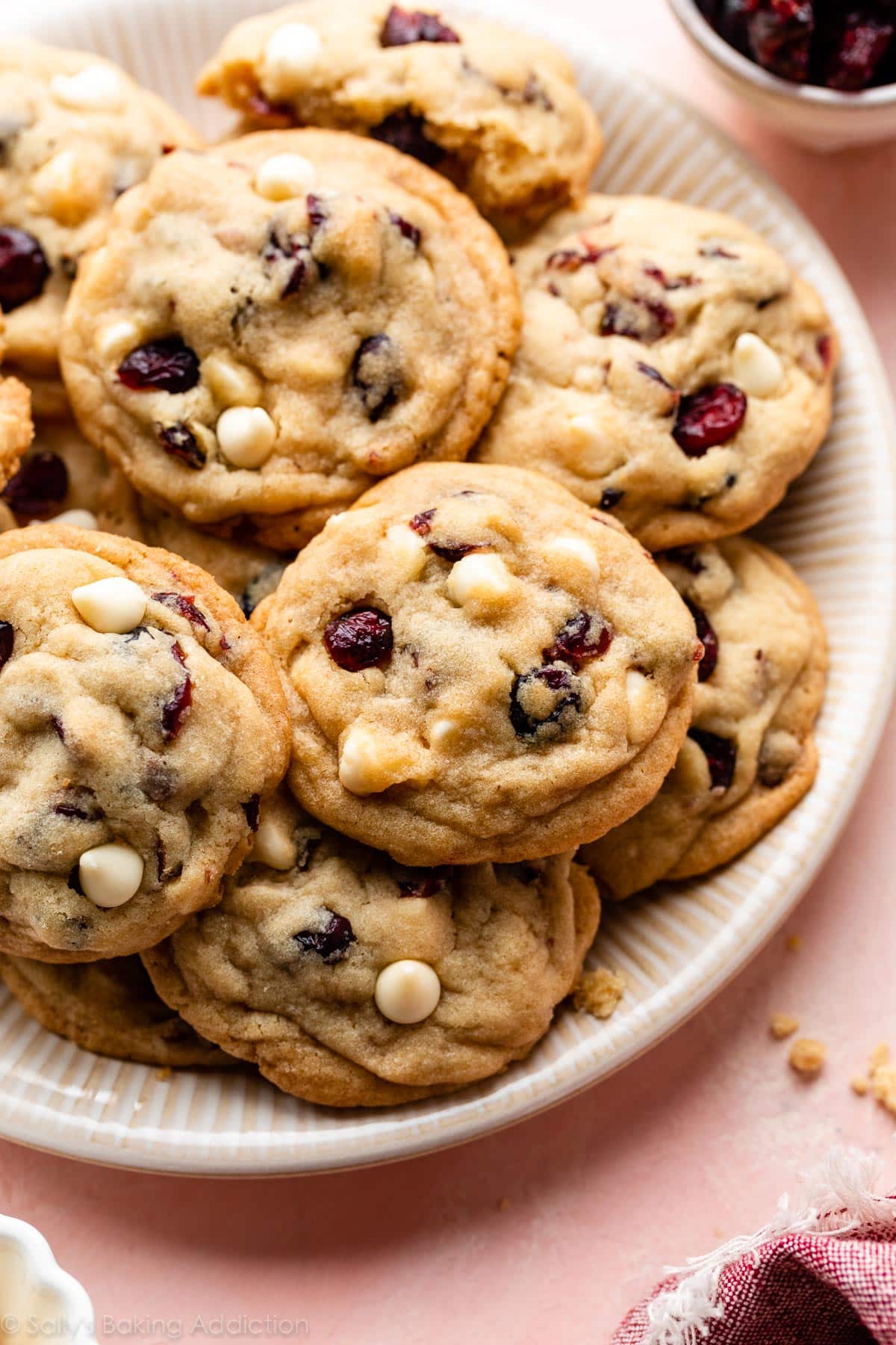 white chocolate chip cranberry cookies on plate