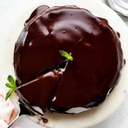 top of a ganache frosted chocolate cake