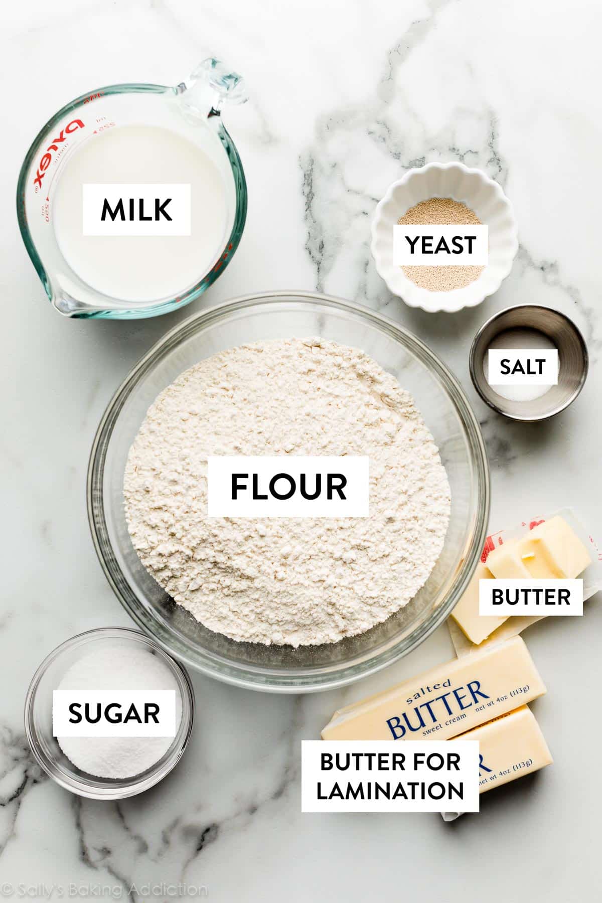 photo of individual ingredients including milk, yeast, salt, flour, butter, and sugar